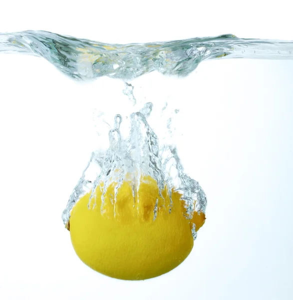 Fresh lemon in water — Stock Photo, Image