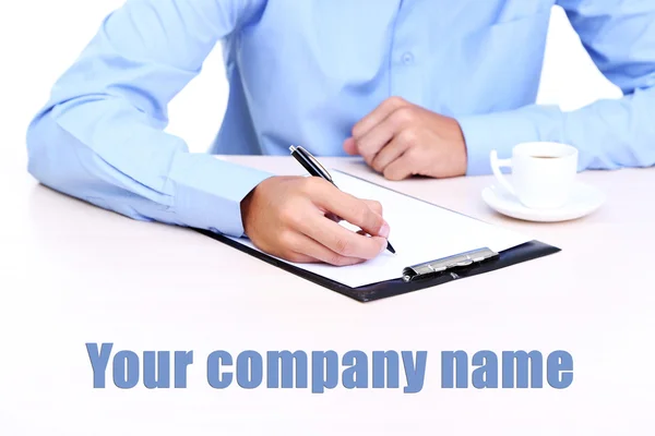 Businessman writing document — Stock Photo, Image