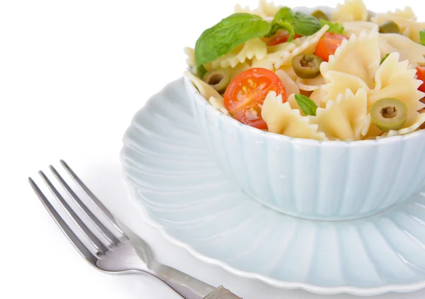 Delicious pasta with tomatoes on plate isolated on white — Stock Photo, Image