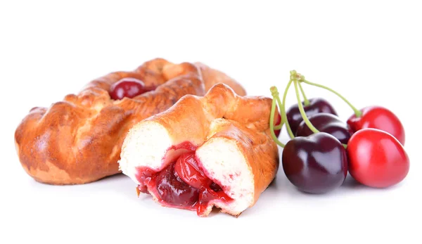 Fresh baked pasties with cherry isolated on white — Stock Photo, Image