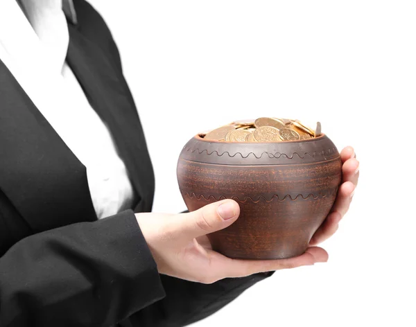 Ceramic pot with golden coins in female hands, isolated on white background — Stock Photo, Image