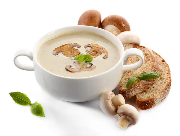 Mushroom soup in white bowl, on plate, isolated on white — Stock Photo, Image