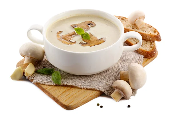 Mushroom soup in white bowl, on napkin, isolated on white — Stock Photo, Image