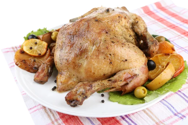 Composition with Whole roasted chicken with vegetables, color napkin, on plate, isolated on white — Stock Photo, Image