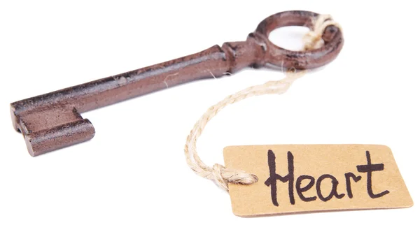 Schlüssel zum Herzen, konzeptionelles Foto. isoliert auf weiß — Stockfoto