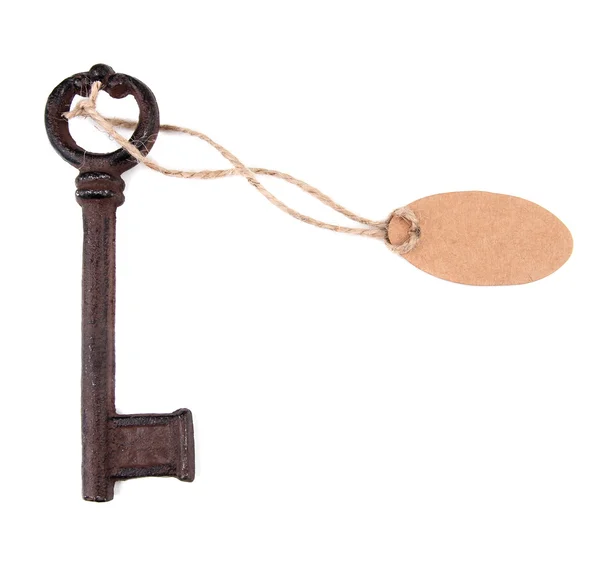 Ключ с пустым тегом, изолированный на белом — стоковое фото