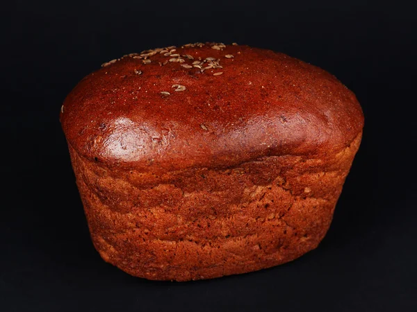 Roti di latar belakang hitam — Stok Foto