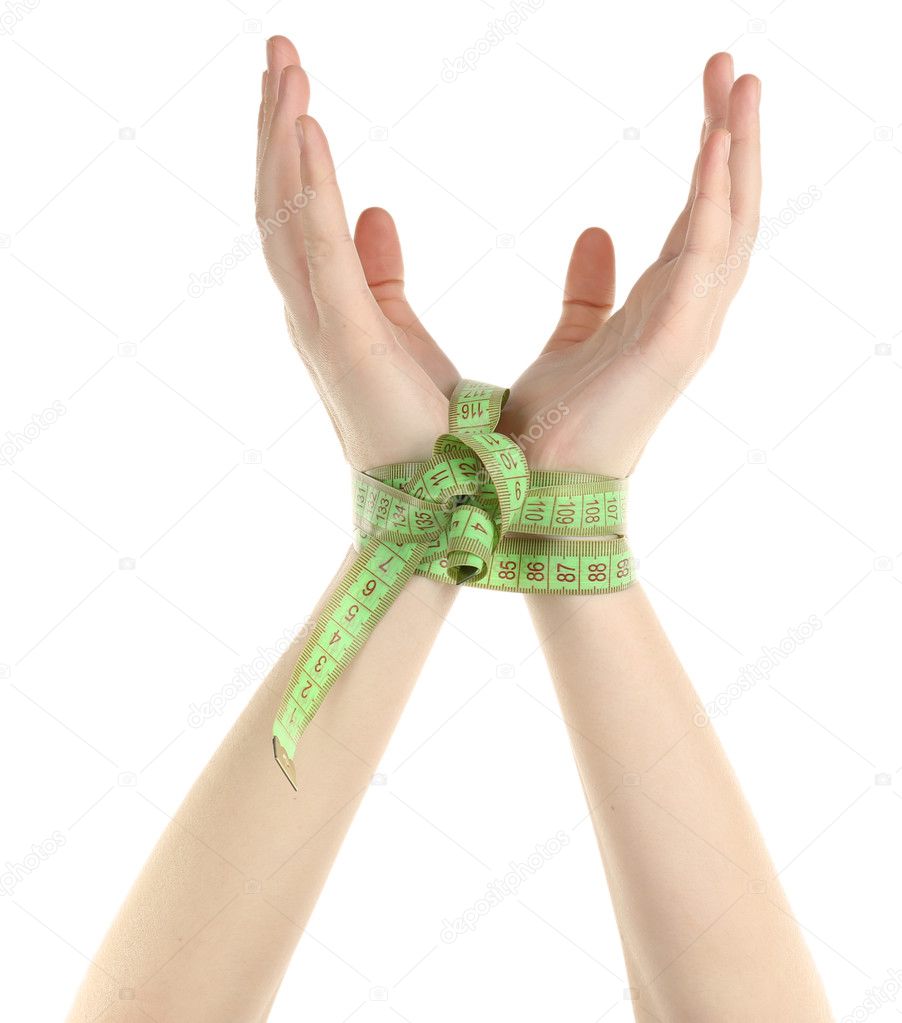 Woman hands with measuring tape isolated on white