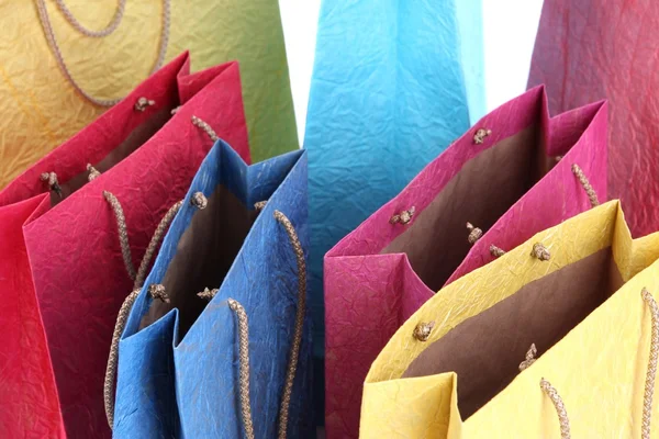 Barevné nákupní tašky, close-up — Stock fotografie