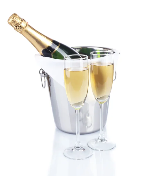 Glasses of champagne in pail, isolated on white — Stock Photo, Image