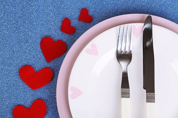 Valentines day dinner with table setting on blue background — Stock Photo, Image