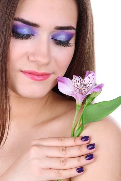 Schöne junge Frau mit Blume aus nächster Nähe — Stockfoto