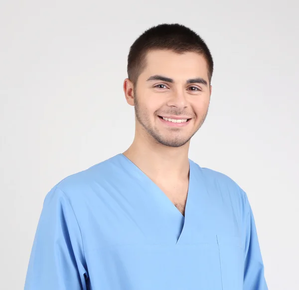 Young male doctor isolated on white — Stock Photo, Image