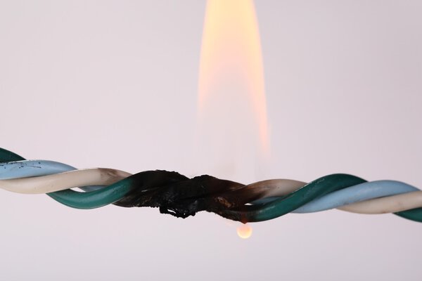 Short circuit, burnt cable, isolated on white