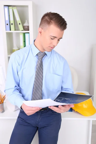 Confident young architect working at office — Stock Photo, Image
