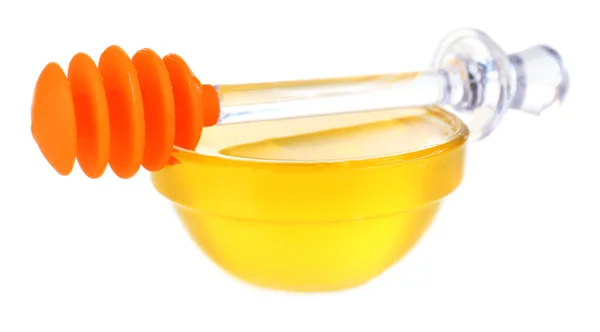 Сладкий мед в стеклянной чаше изолирован на белом — стоковое фото