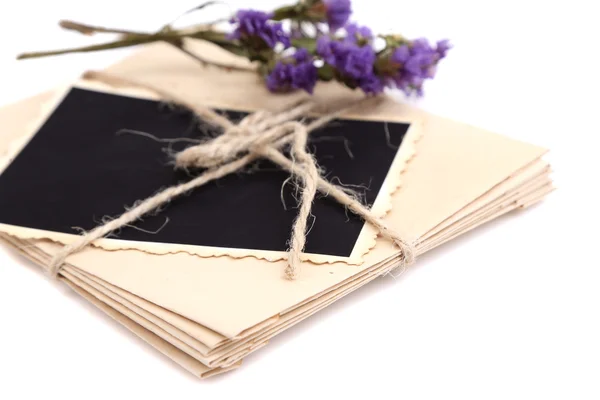 Foto vieja en blanco, letras y flor seca, aislado en blanco —  Fotos de Stock