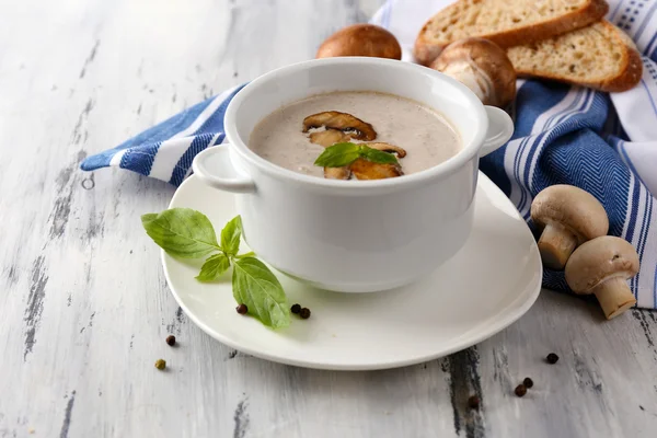 Mushroom soup in white pots, on napkin,  on wooden background — Stock Photo, Image