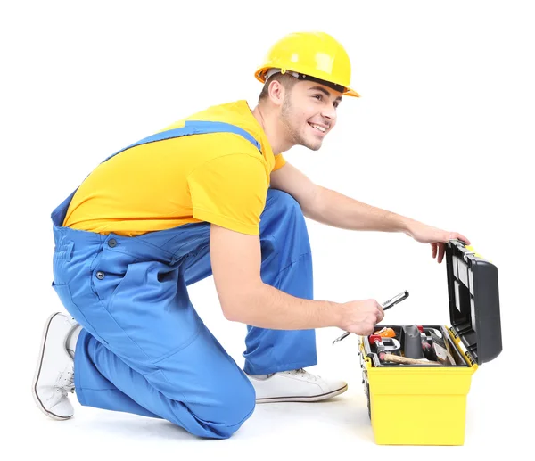 Construtor masculino em capacete amarelo isolado em branco — Fotografia de Stock