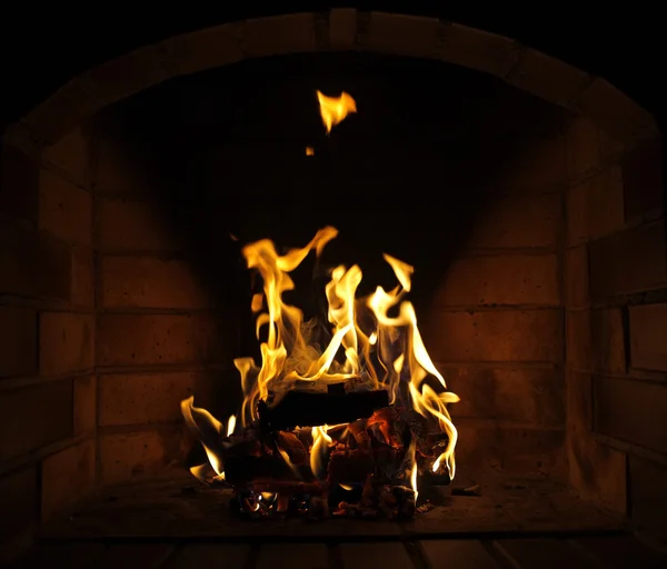 Fire in fireplace Stock Photo by ©belchonock 41234875