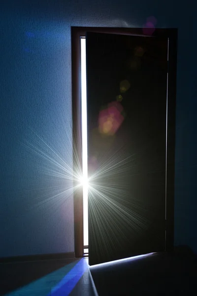 Open door with bright light outside — Stock Photo, Image