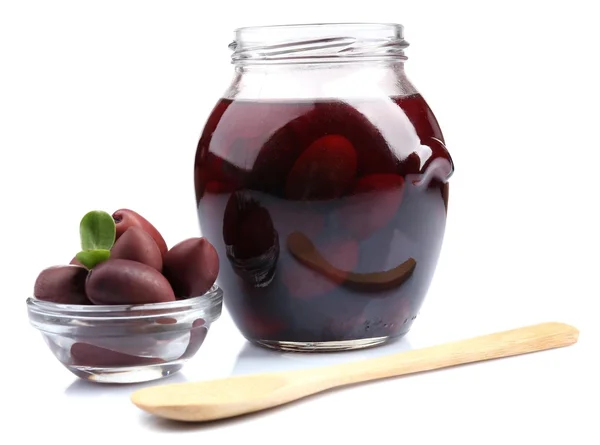 Black olives in glass jar, isolated on white — Stock Photo, Image