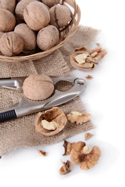 Louskáček s ořechy izolovaných na bílém — Stock fotografie