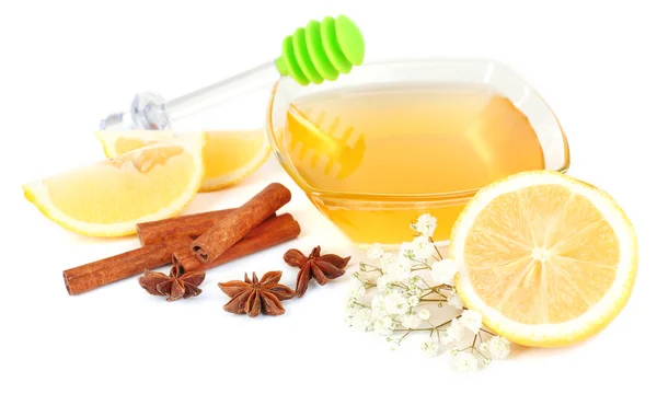 Sweet honey with lemon and cinnamon isolated on white — Stock Photo, Image