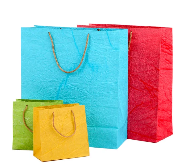 Bolsas de compras coloridas, aisladas en blanco — Foto de Stock