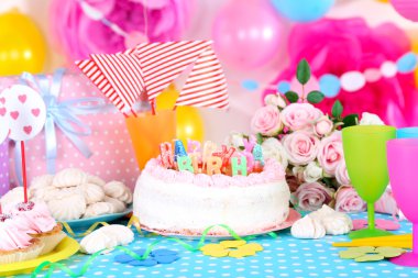 Festive table setting for birthday on celebratory decorations  clipart
