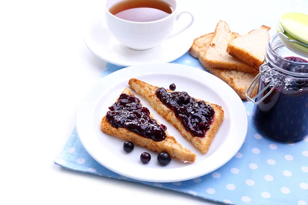 Delicious toast with jam on plate close-up — Stock Photo, Image