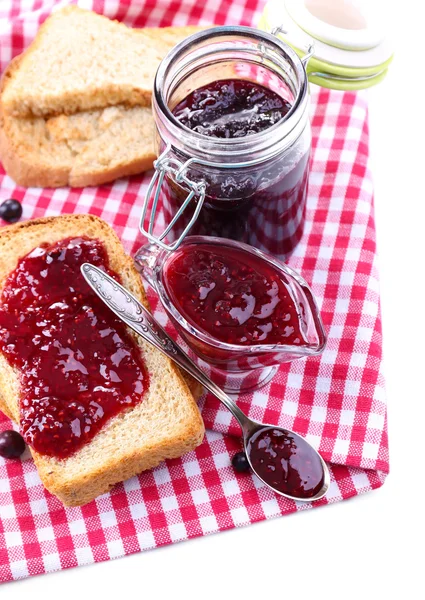 Delicious toast with jam on table close-up — Stock Photo, Image