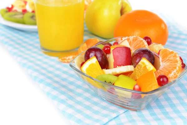 Sweet fresh fruits in bowl on table close-up — Stock Photo, Image