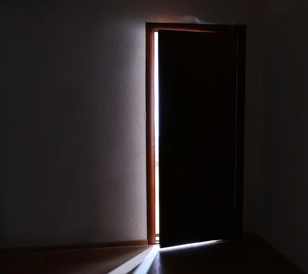 Open door with bright light outside — Stock Photo, Image