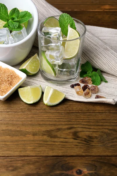 Ingredients for lemonade on wooden table — Stock Photo, Image