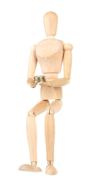 Wooden small mannequin with money isolated on white
