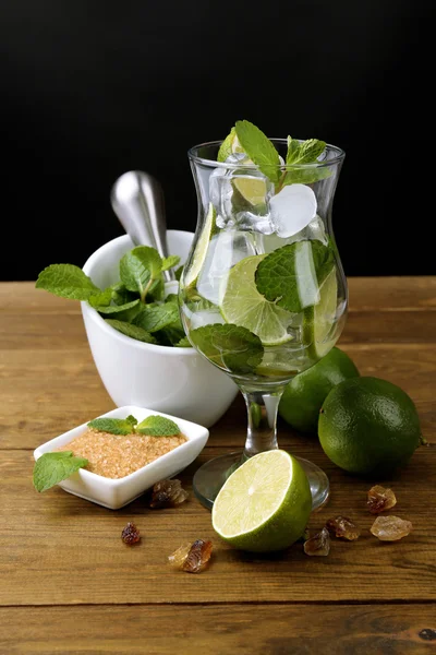 Ingredients for lemonade on wooden table, on grey background — Stock Photo, Image