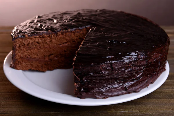 Delicious chocolate cake on table close-up — Stock Photo, Image