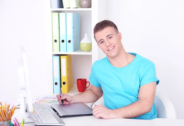 Young creative designer working at office — Stock Photo, Image