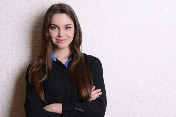 Portrait of business woman near wall — Stok Foto