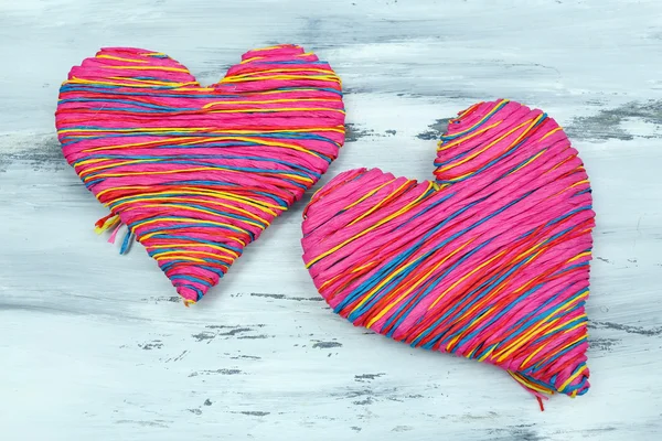 Decoratieve hart op houten achtergrond — Stockfoto