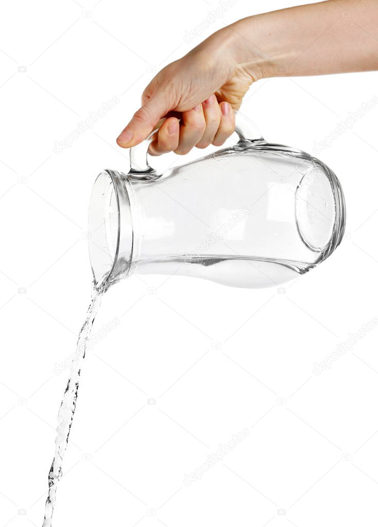 Pouring water from glass pitcher, isolated on white Stock Photo by