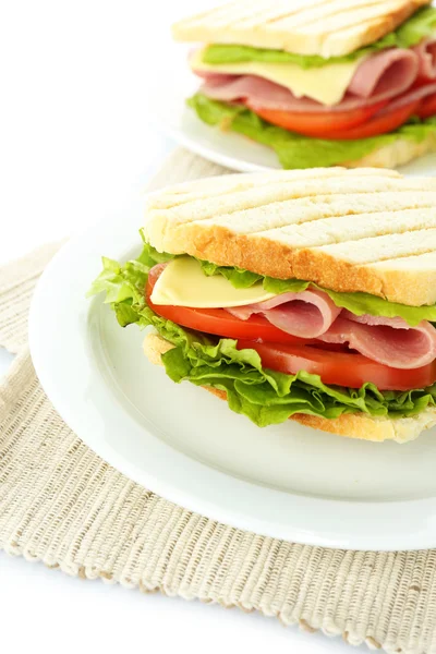 Sabrosos sándwiches con jamón, aislados en blanco — Foto de Stock