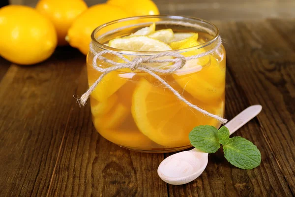 Tasty lemon jam on table close-up — Stock Photo, Image