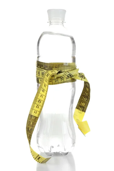 Bottle of water with measuring tape, isolated on white — Stock Photo, Image