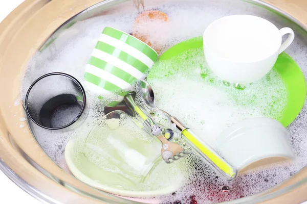 Utensils soaking in kitchen sink — Stock Photo, Image