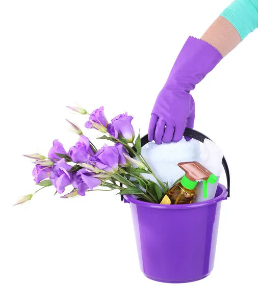 Housewife holding bucket with cleaning equipment. Conceptual photo of spring cleaning. Isolated on white — Stock Photo, Image