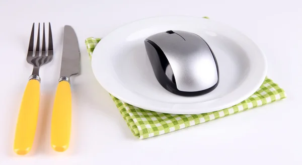 Computer mouse on plate with fork and knife isolated on white — Stock Photo, Image