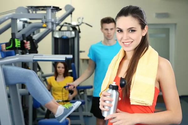 Young beautiful girls in gym — Stock Photo, Image