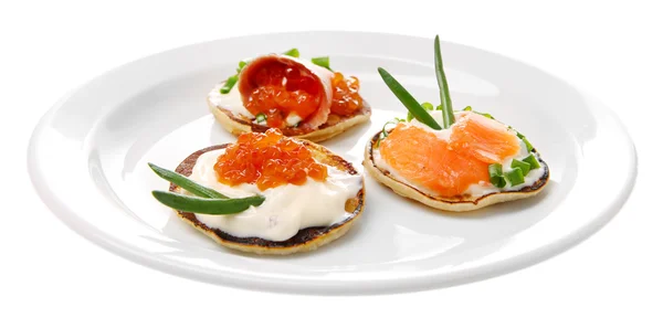 Pancakes with red caviar and salmon,  isolated on white — Stock Photo, Image